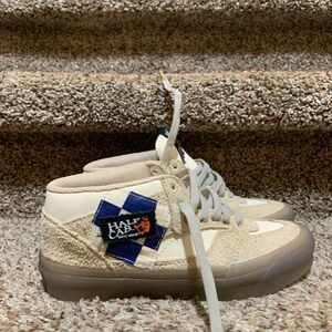 Vans Beige Sneakers with Black and Orange Accents